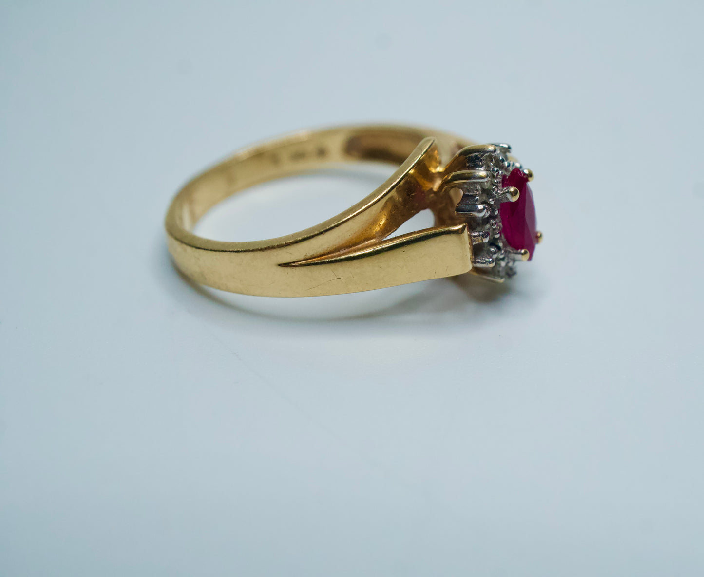 Vintage Marquise-Cut Ruby and Diamond Halo Ring