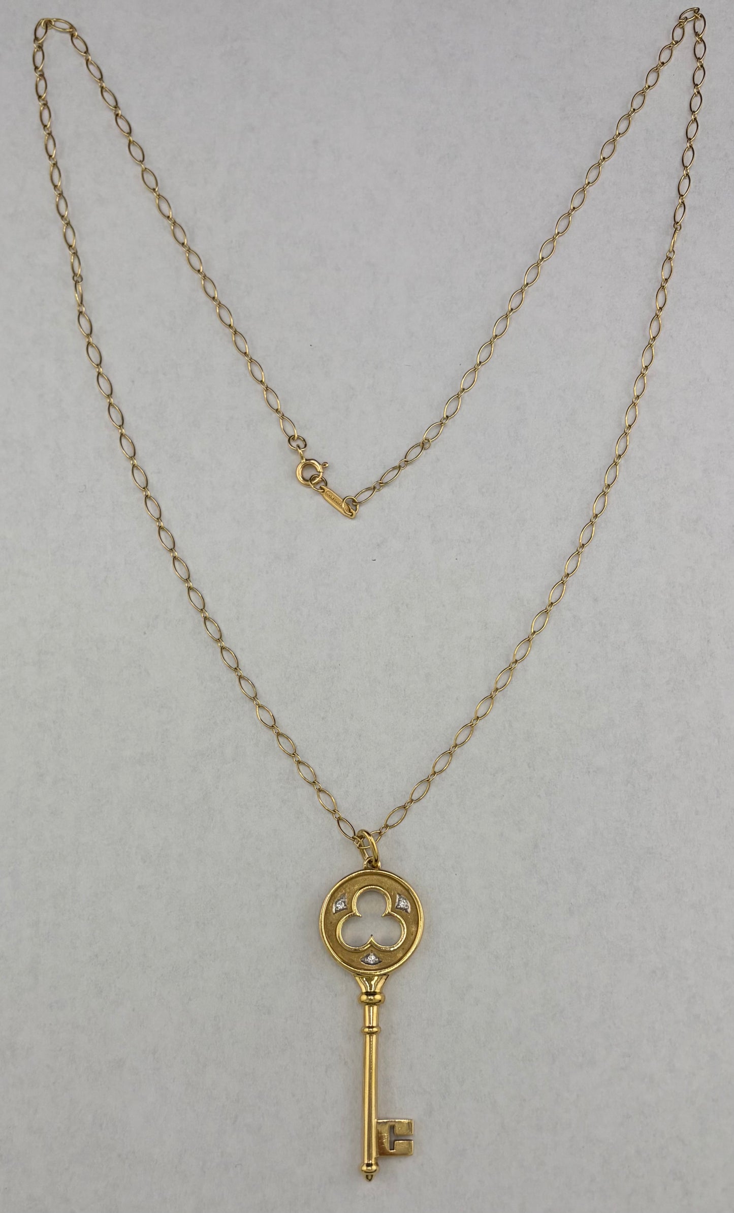 18k Tiffany & Co Yellow Gold Diamond Clover Key Pendant on 24" Oval Link Necklace 750