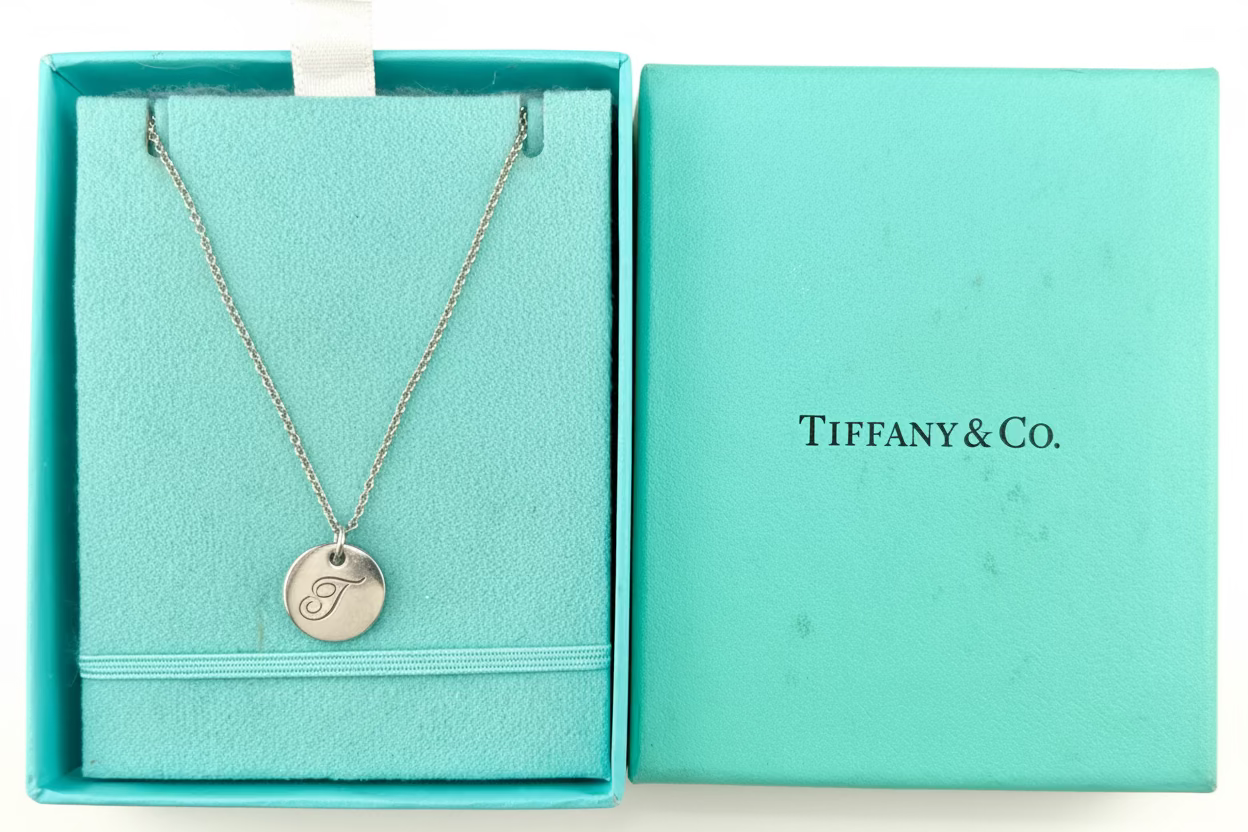 Tiffany &. Co Engraved Notes Initial "T" Round Disc Letter Pendant Necklace 925 Sterling Silver