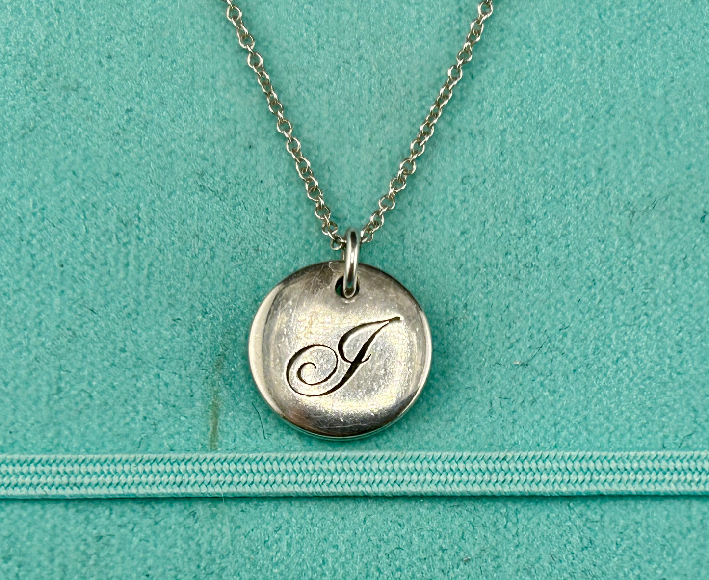 Tiffany &. Co Engraved Notes Initial "T" Round Disc Letter Pendant Necklace 925 Sterling Silver
